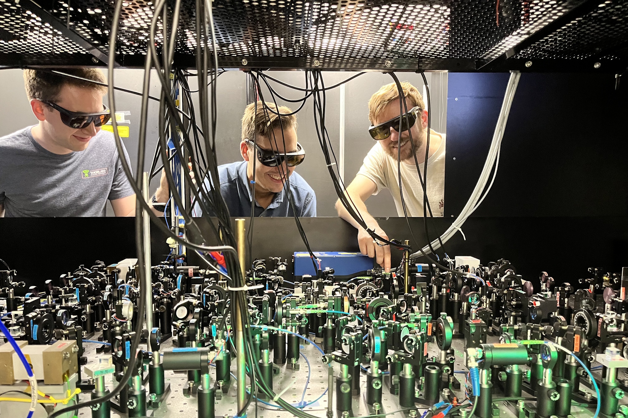 Tom, Dan, and Caleb aligning some laser beams.